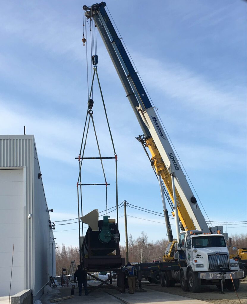 Tarmac Dryer Being Unloaded By A Crane With Spreader Bars. Easy Does It.
